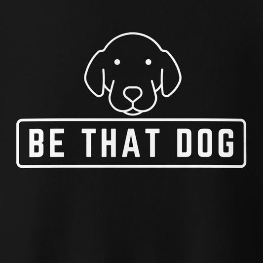 The Be THAT Dog Minimalist Sweatshirt by THiNK LiKE A DOG® features a minimalist white line drawing of a dog's face on a black background with "BE THAT DOG" in bold, perfect for dog lovers and cozy streetwear fans.