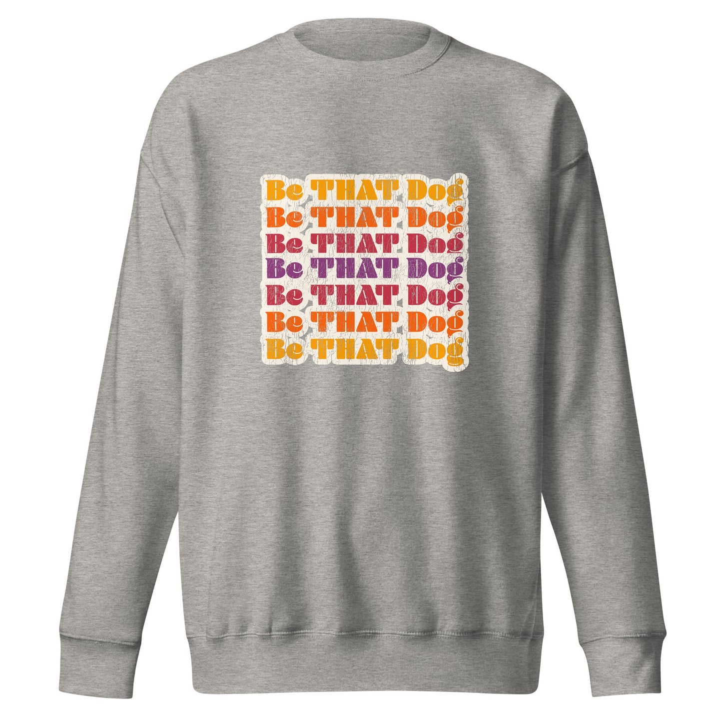 The THiNK LiKE A DOG® Be THAT Dog Retro Sweatshirt is a ‘70s-style unisex sweater in gray, featuring bold orange, purple, and white lettering for dog lovers.