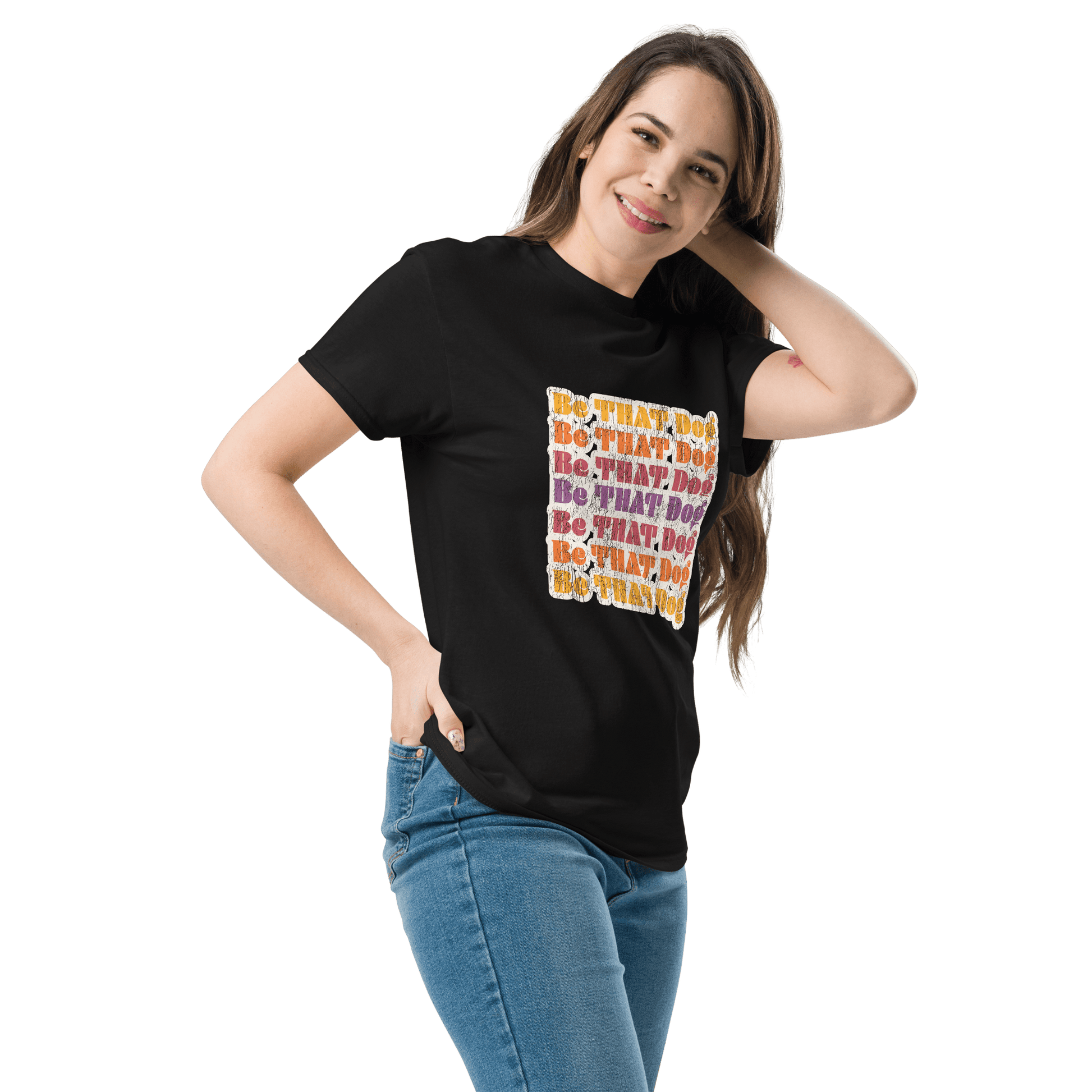 Person smiling with hand on hip, wearing a black '70s-inspired THiNK LiKE A DOG® unisex tee featuring colorful vintage-style text. Ideal for dog lovers who appreciate retro fashion. White backdrop.