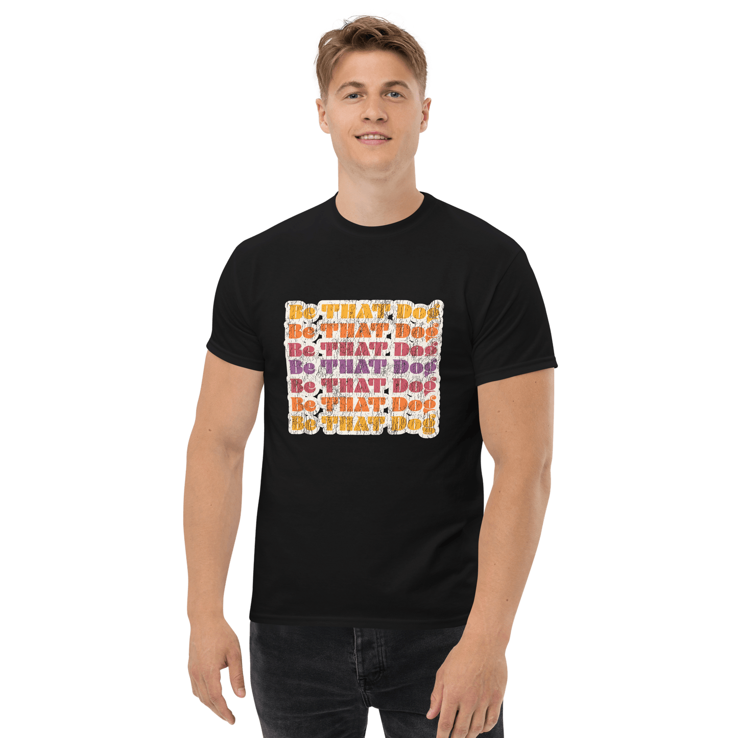 A person wearing a retro unisex tee from THiNK LiKE A DOG® displays the vibrant slogan "Be THAT Do!" against a white background, featuring the ‘70s-inspired funny dog lover design.