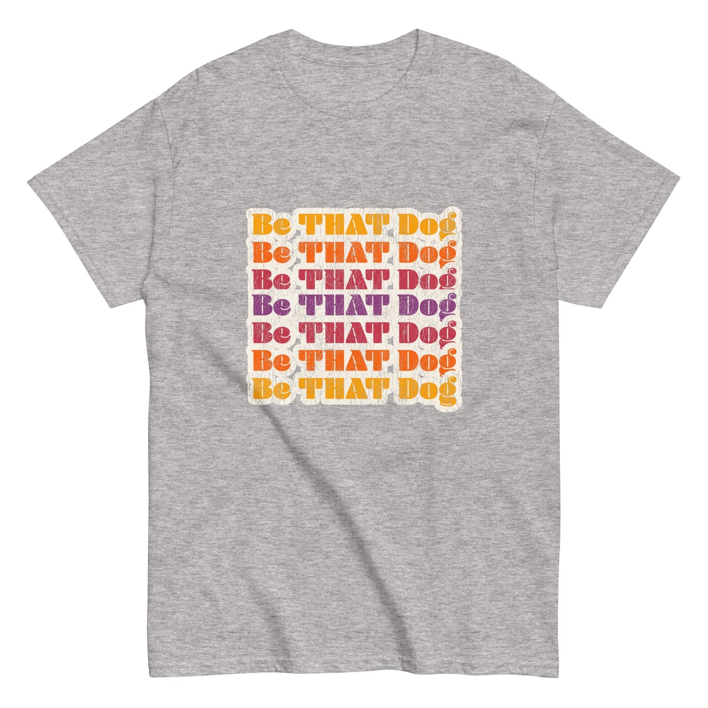 The '70s-inspired Be That Dog Retro Unisex Tee by THiNK LiKE A DOG® features "Be THAT Dog" in vibrant orange, yellow, pink, and red. This gray tee is perfect for dog lovers with its bold message.