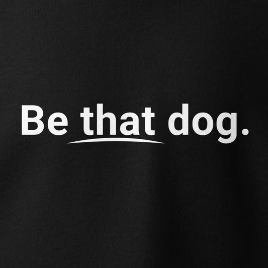 Text on a black background reads, "Be that dog," encapsulating the essence of the THiNK LiKE A DOG® Unisex Dog Lover Hoodie. The minimalist yet stylish design makes it a perfect addition to any dog lover’s wardrobe.