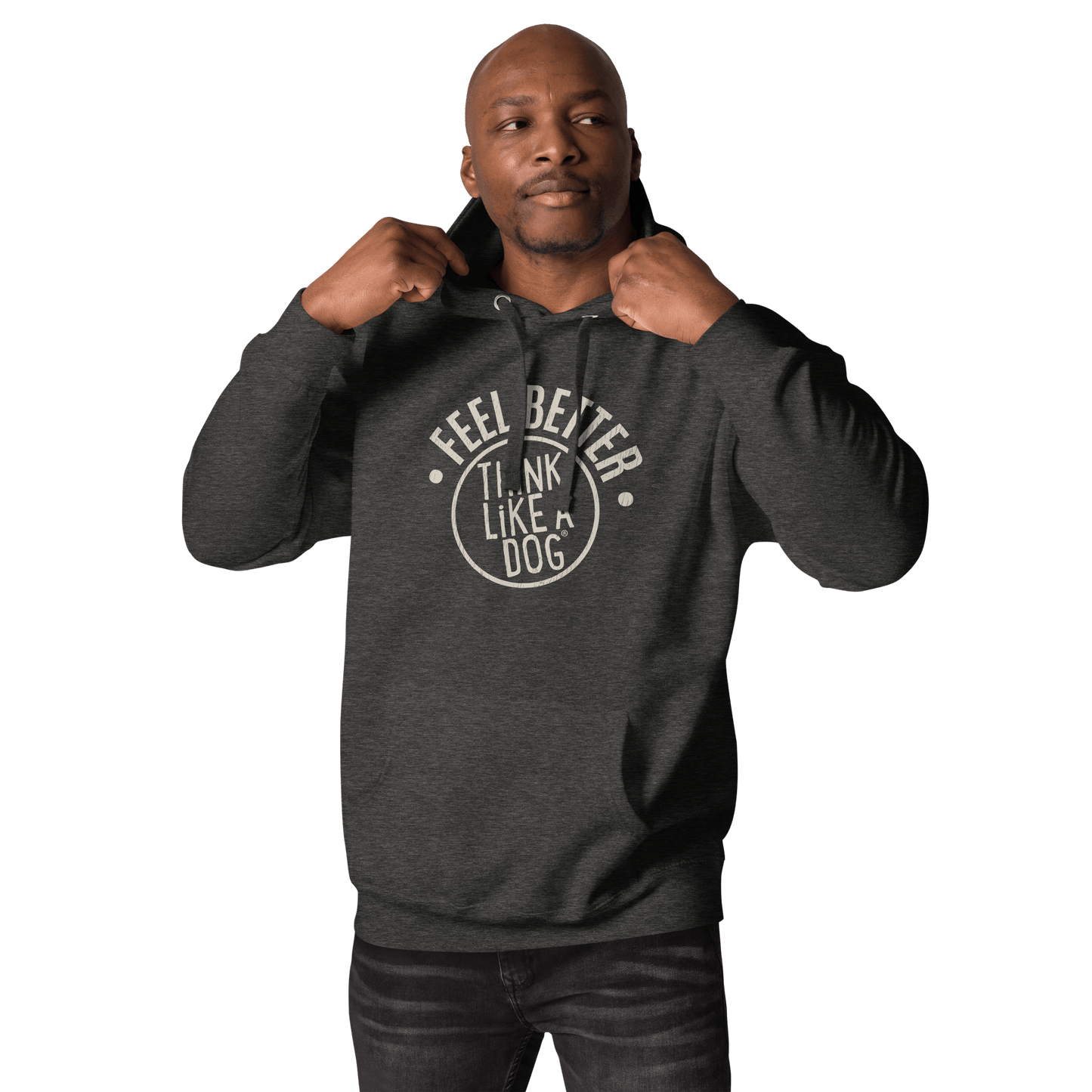 A person wearing a dark THiNK LiKE A DOG® "Feel Better Dog Lover Hoodie – Cozy Gift for Dog Moms & Pet Owners," adjusts the hood with both hands against a black background.