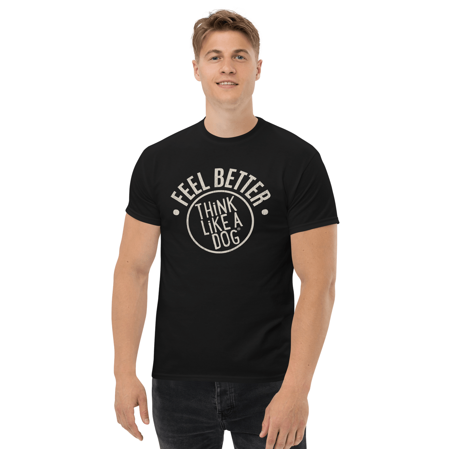 A man smiles at the camera wearing the Feel Better Dog Lover T-Shirt by THiNK LiKE A DOG®, radiating pet-inspired joy.