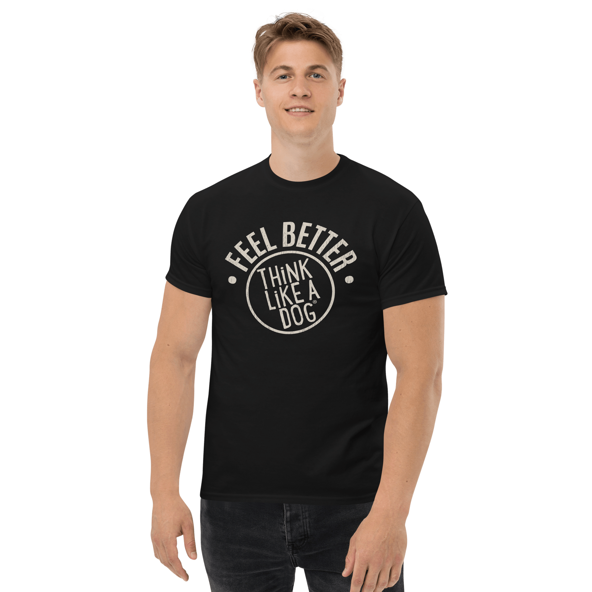 A man smiles at the camera wearing the Feel Better Dog Lover T-Shirt by THiNK LiKE A DOG®, radiating pet-inspired joy.
