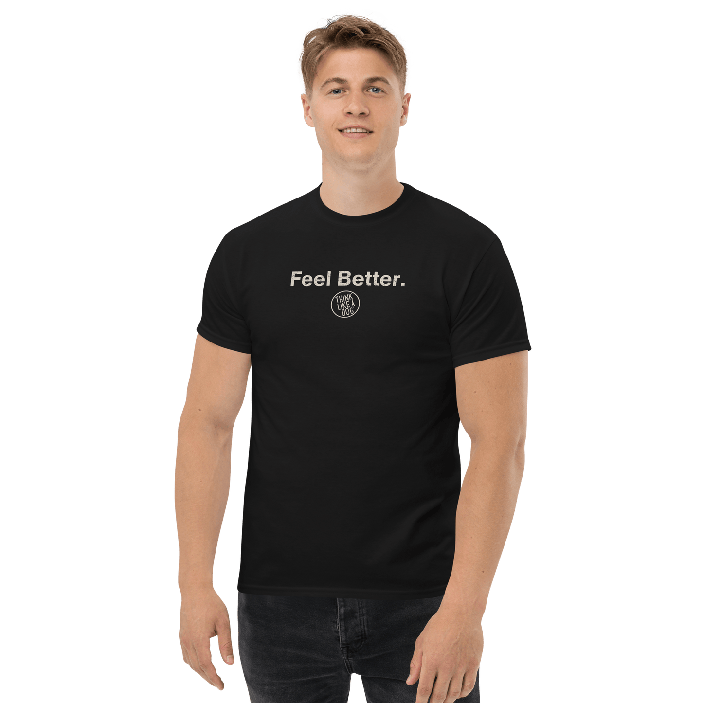 A person wearing a THiNK LiKE A DOG® black T-shirt with the text "Feel Better." and a small circular logo below, perfect for pet owners.