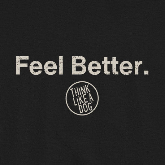 A unisex shirt by THiNK LiKE A DOG® features "Feel Better" text on black, and a circular logo. This "Feel Better Dog Lover T-Shirt with Logo" is the ideal comforting gift for pet owners who cherish companionship.