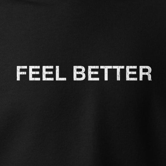 A unisex hoodie from THiNK LiKE A DOG® features a black backdrop with the bold white capital text "FEEL BETTER," echoing classic streetwear vibes.