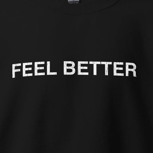The Unisex Sweatshirt - Feel Better Clean by THiNK LiKE A DOG® features bold "FEEL BETTER" text in distressed white on black, crafted from pre-shrunk, air-jet spun yarn for softness and reduced pilling, perfectly combining comfort and style.