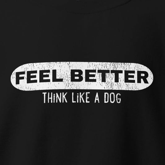 The THiNK LiKE A DOG® Unisex Sweatshirt - Feel Better Pill is a classic fit, black with white text saying "FEEL BETTER THINK LIKE A DOG" in an oval frame. This pre-shrunk piece offers lasting comfort and style for any casual occasion.