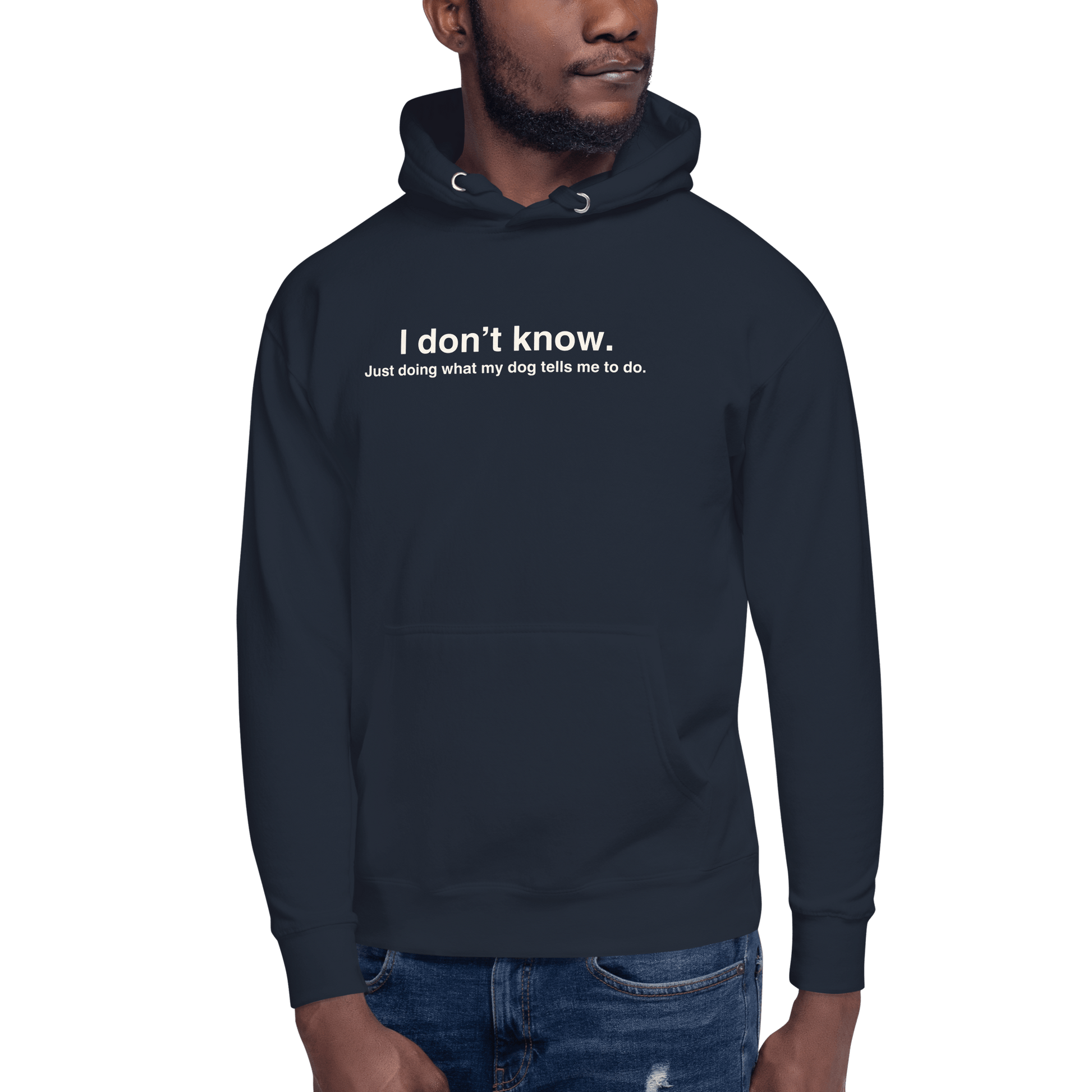 A person wears the THiNK LiKE A DOG® Funny Dog Hoodie – Just Doing What My Dog Tells Me, a dark unisex hoodie with a playful quote—an ideal gift for dog lovers.
