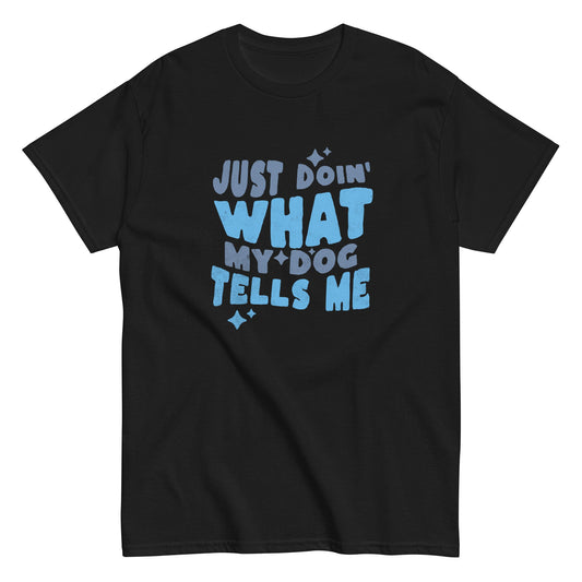 The THiNK LiKE A DOG® Funny Dog Lover Shirt features blue text "Just Doin' What My Dog Tells Me" with small stars, perfect for fans of humorous canine-themed shirts.
