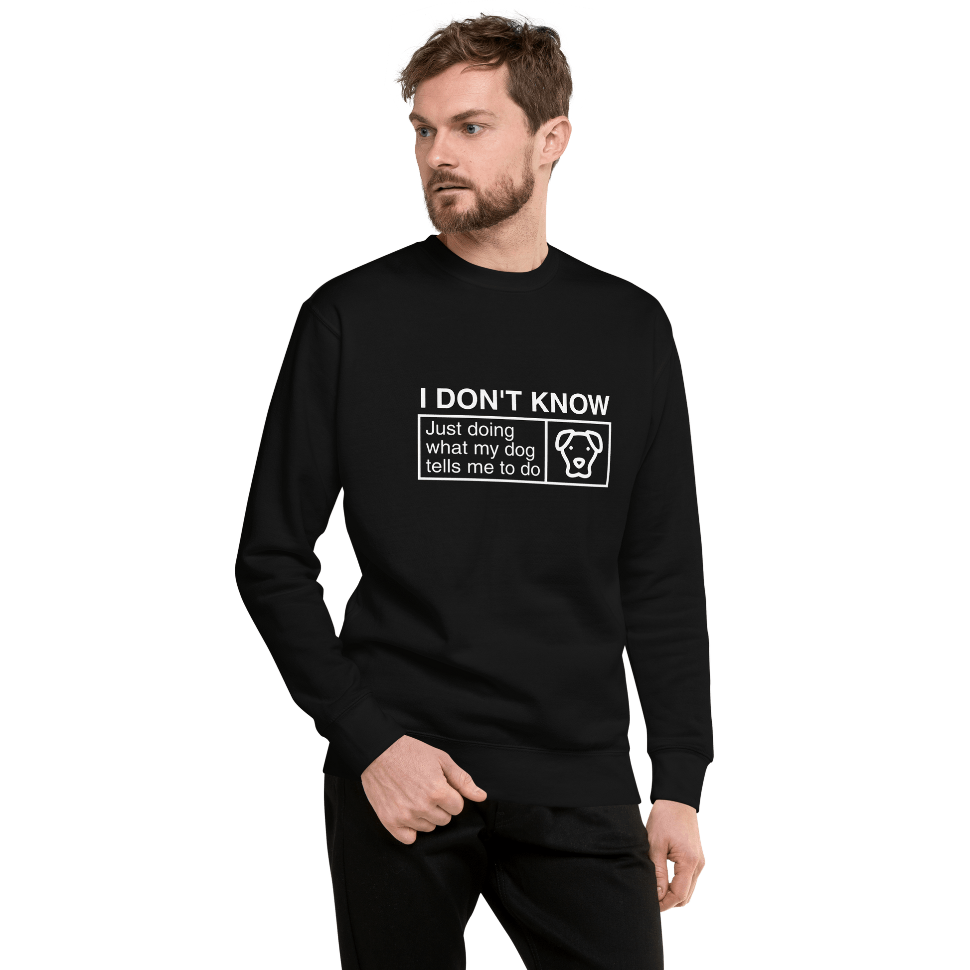 A man wears the Funny Dog Lover Sweatshirt by THiNK LiKE A DOG®, featuring the text "I Don’t Know, Just Doing What My Dog Tells Me" and a simple dog drawing—perfect for any funny dog lover.