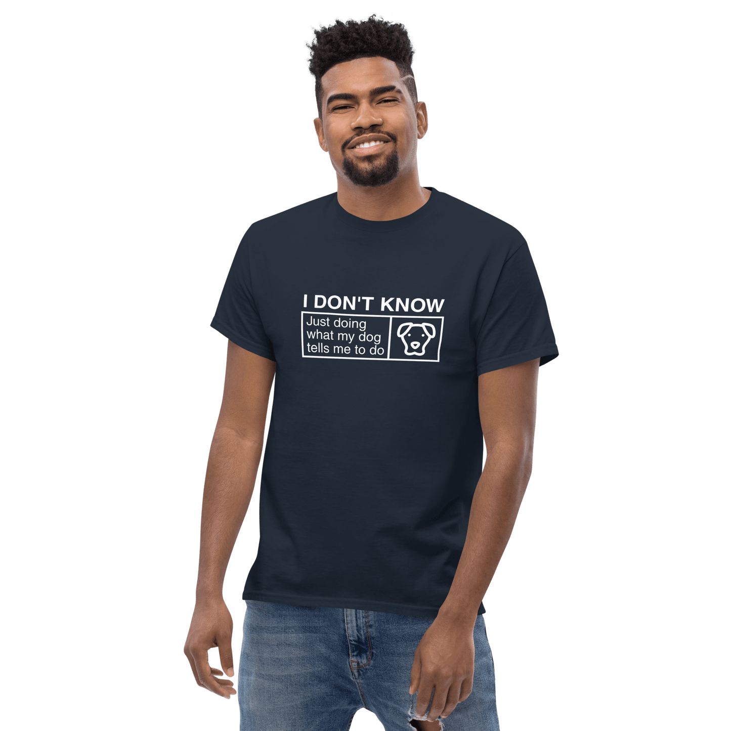 Someone wears the THiNK LiKE A DOG® Funny Dog Shirt – Dog Icon “Just Doing What My Dog Tells Me,” featuring a navy design, a simple dog face line drawing, and the quote—great gift for any dog lover.