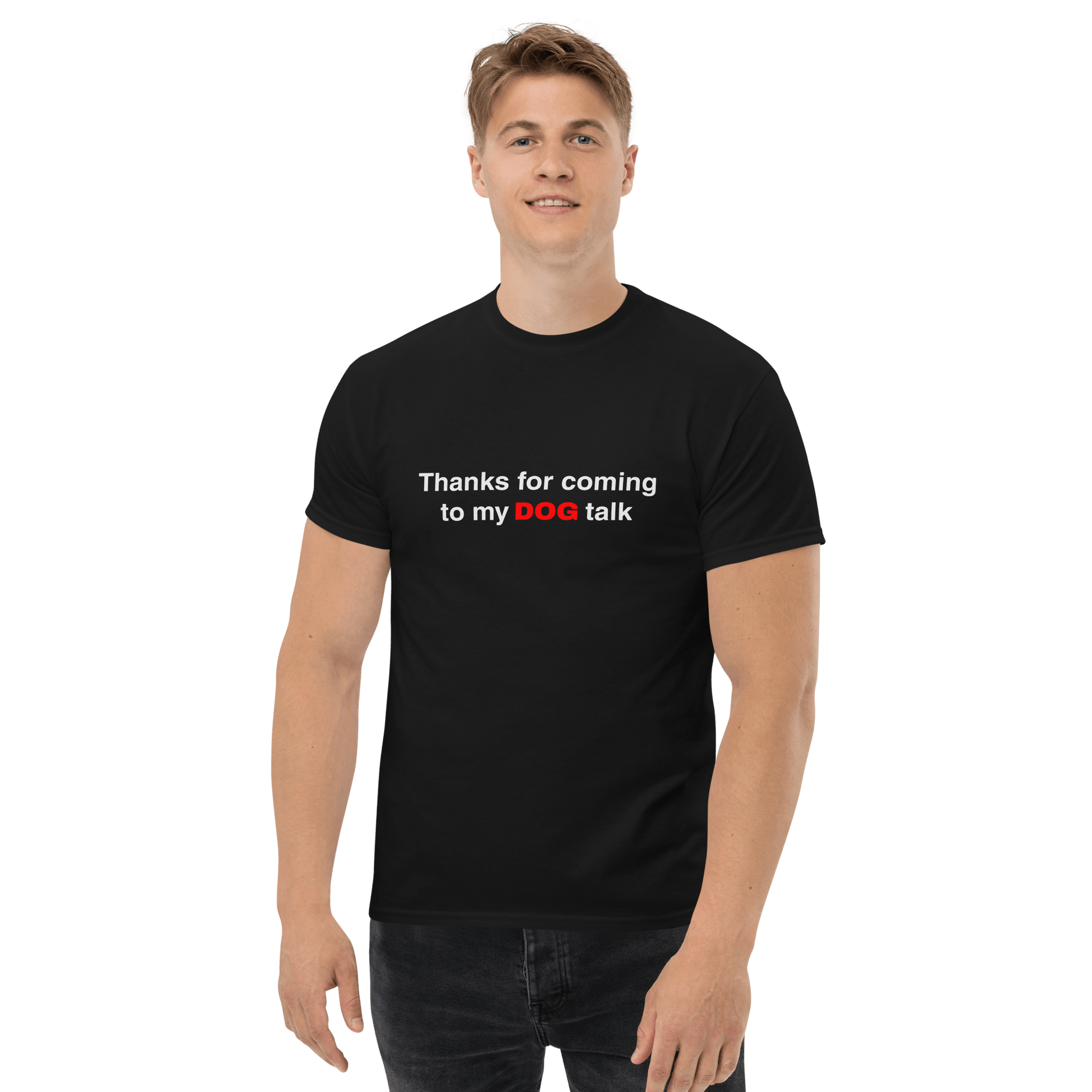 A man stands against a green background wearing the THiNK LiKE A DOG® Funny Dog Shirt – Thanks for Coming to My Dog Talk, with "dog" highlighted in red—the perfect gift for dog lovers.