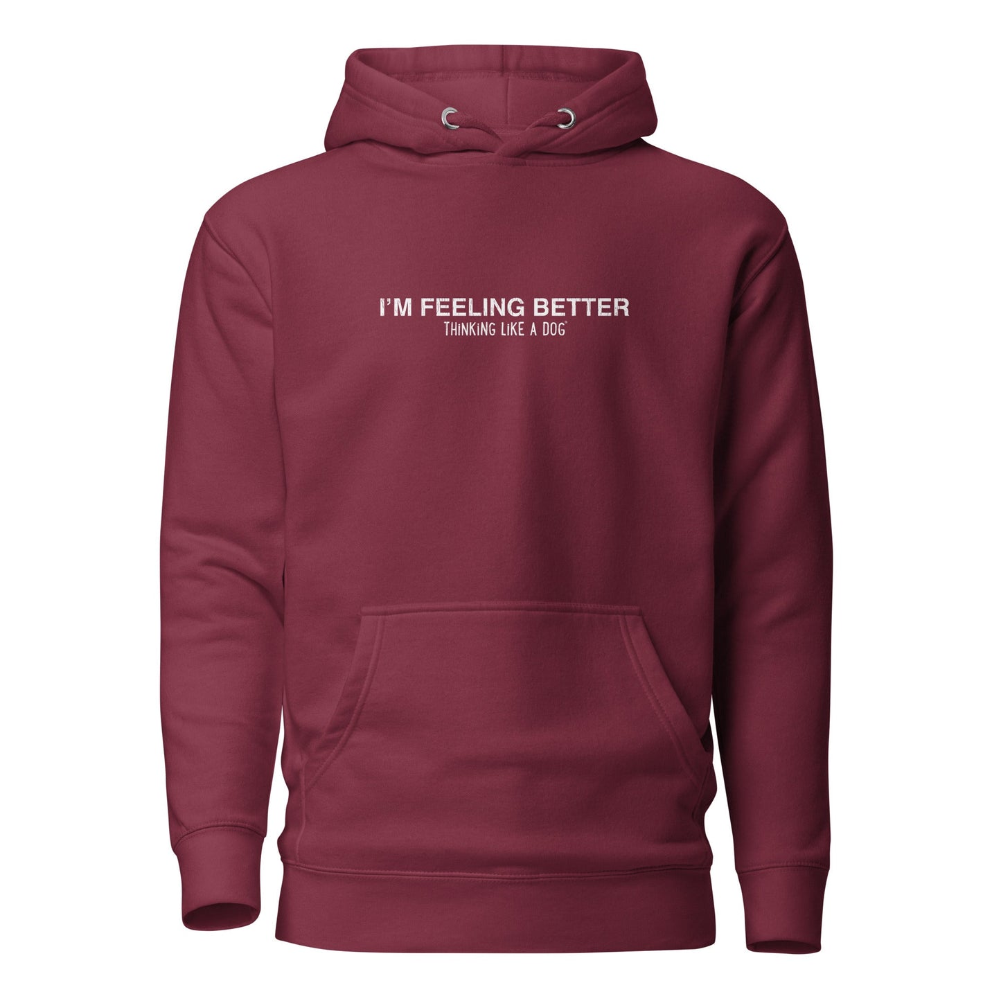 The THiNK LiKE A DOG® 'I’m Feeling Better Thinking Like a Dog®' hoodie features a front pocket and the uplifting message "I'M FEELING BETTER THINKING LIKE A DOG" in white. Its maroon color provides cozy comfort, adding dog-inspired positivity to your wardrobe.