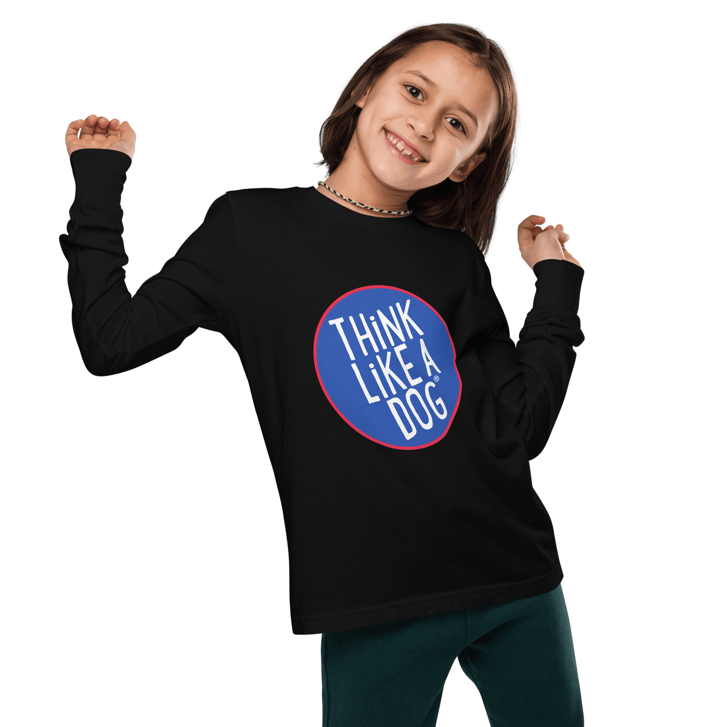 A child in a THiNK LiKE A DOG® Kids' Think Like A Dog NASA-Style Long Sleeve Tee smiles with arms raised against a black background.