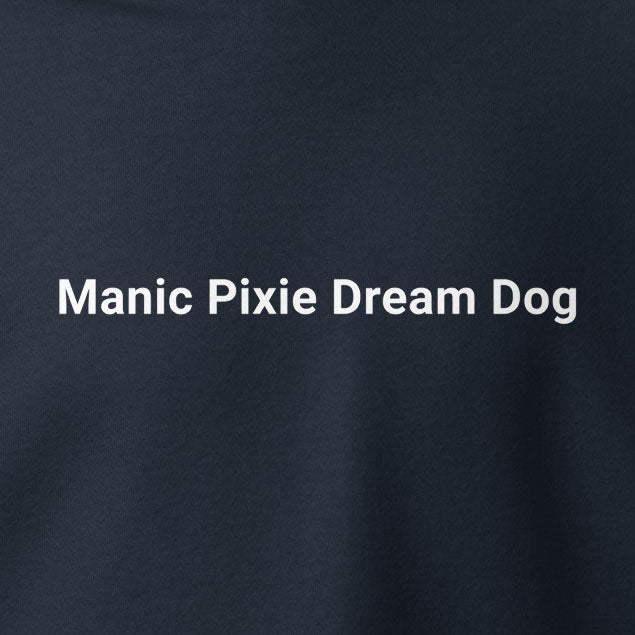 The Manic Pixie Dream Dog Hoodie – Minimalist Comfort by THiNK LiKE A DOG® features "Manic Pixie Dream Dog" text in white on dark fabric—an ideal, thoughtful gift for dog lovers who appreciate minimalist style.