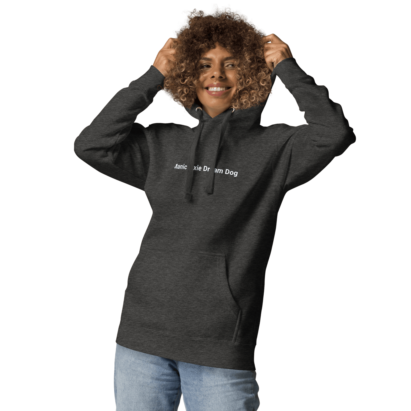 A person with curly hair smiles, showing off THiNK LiKE A DOG®'s Manic Pixie Dream Dog Hoodie—a dark gray minimalist design made for dog lovers.