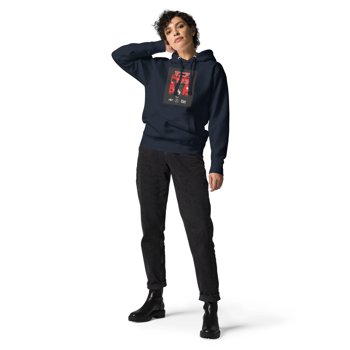Sporting THiNK LiKE A DOG®'s Manic Pixie Dream Dog Kanji Hoodie in navy, a person stands against a sleek black background, hand behind head, paired with black jeans and boots.