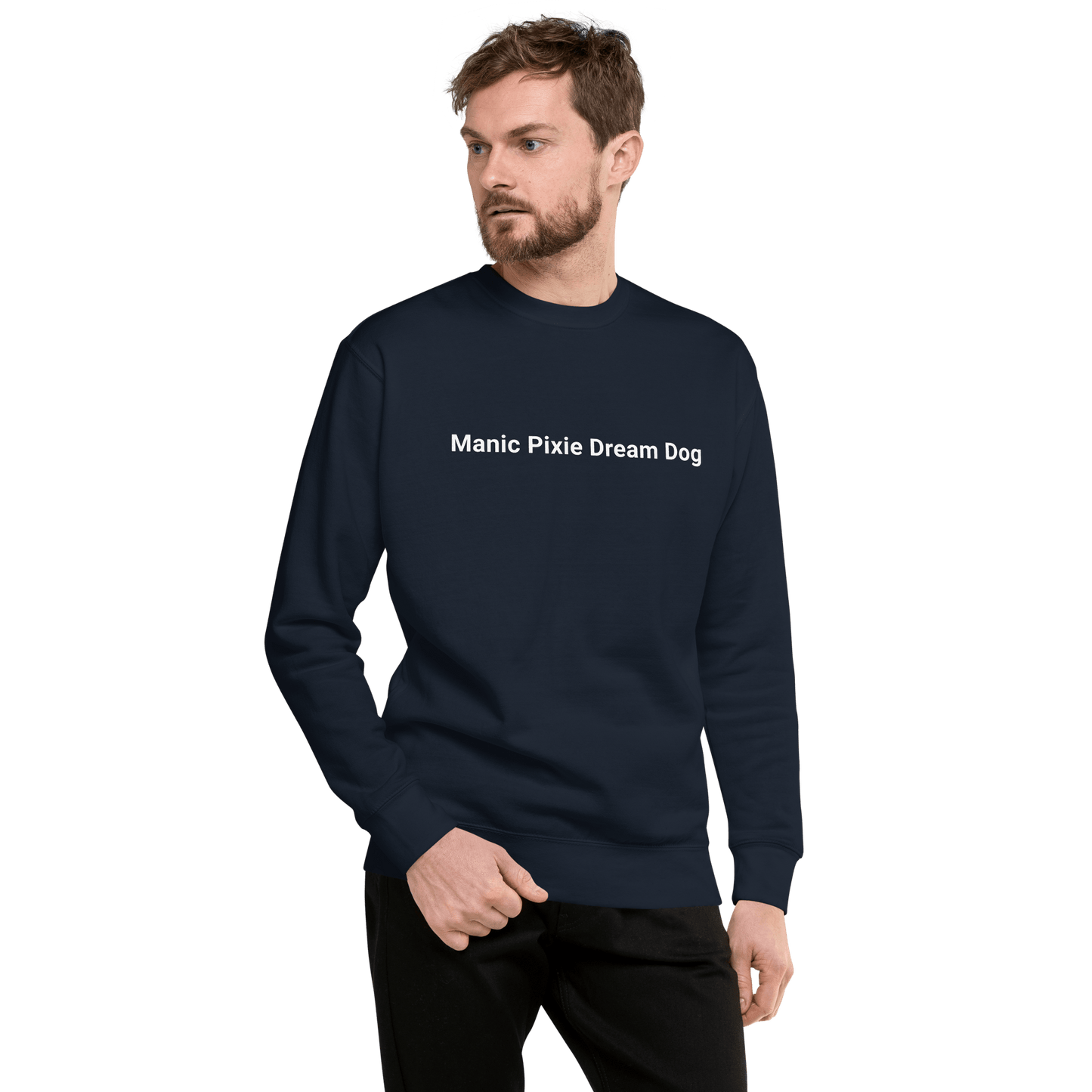A man wears the "Manic Pixie Dream Dog Navy Sweatshirt – Minimalist & Stylish Tee" from THiNK LiKE A DOG®, standing against a simple green backdrop.