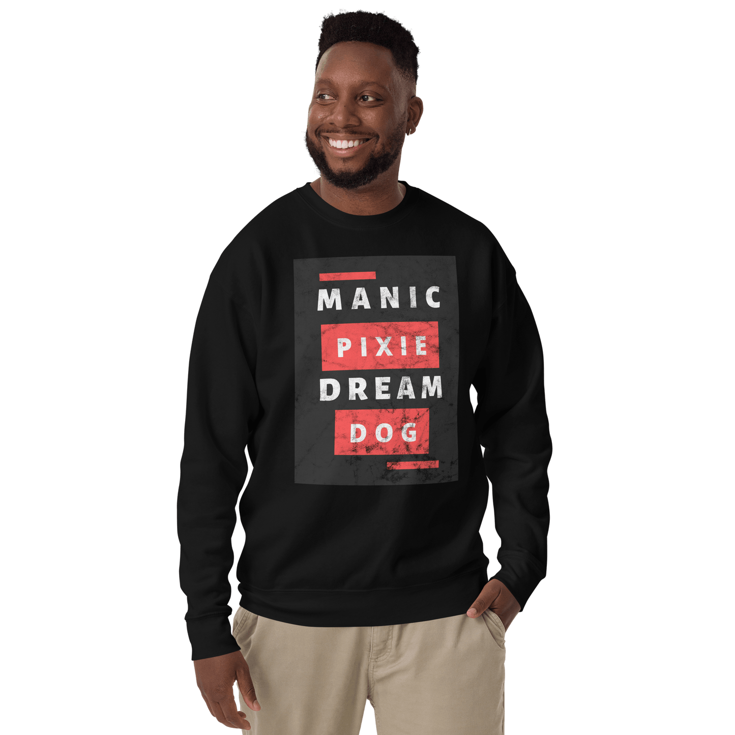 Man smiling in a THiNK LiKE A DOG® "Manic Pixie Dream Dog Sweatshirt – Unique Funny Comfort," featuring bold white and red text, against a green background. Great gift for dog owners and a must-have for any dog lover’s wardrobe.