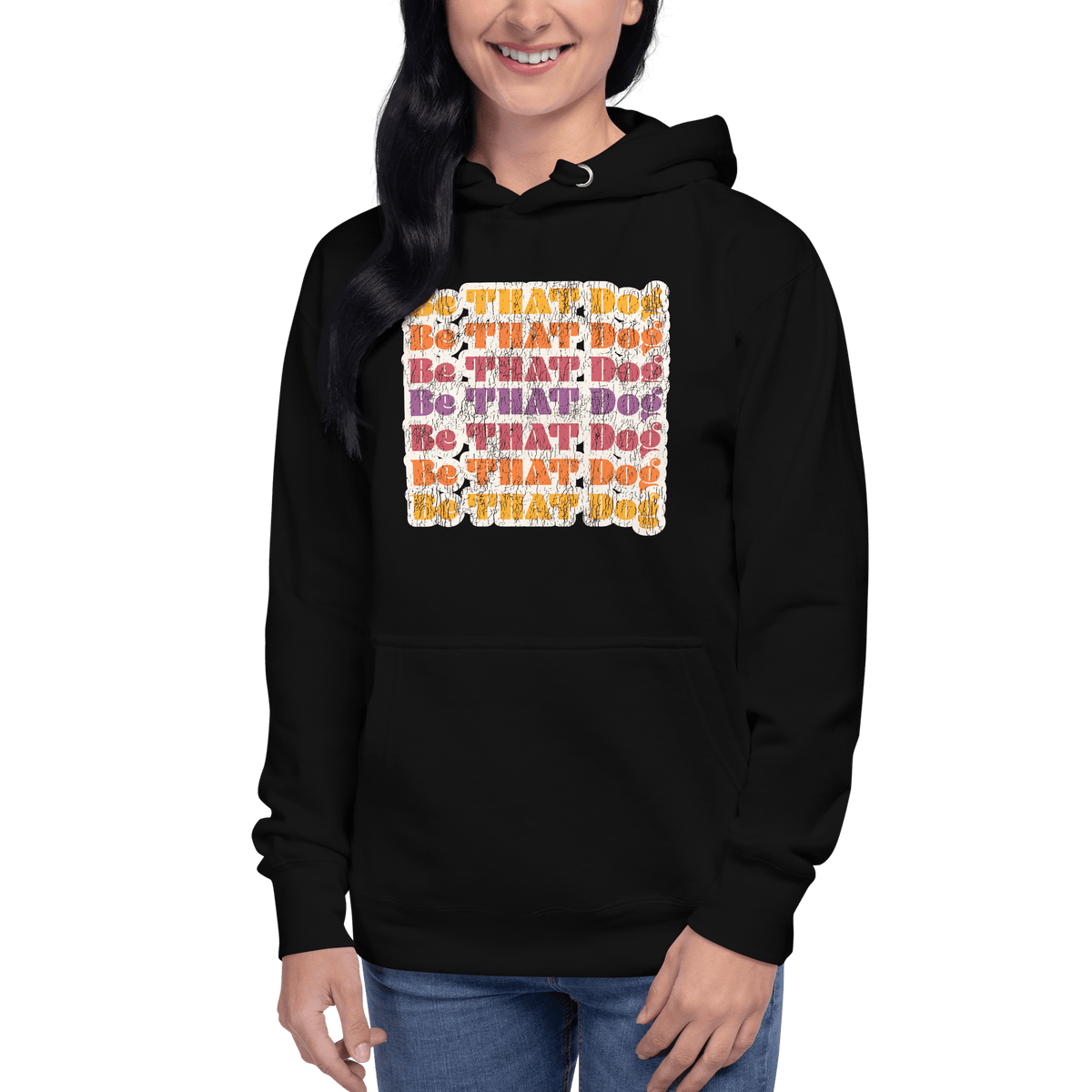 A woman wearing the THiNK LiKE A DOG® Be That Dog — Retro Hoodie in black fleece.