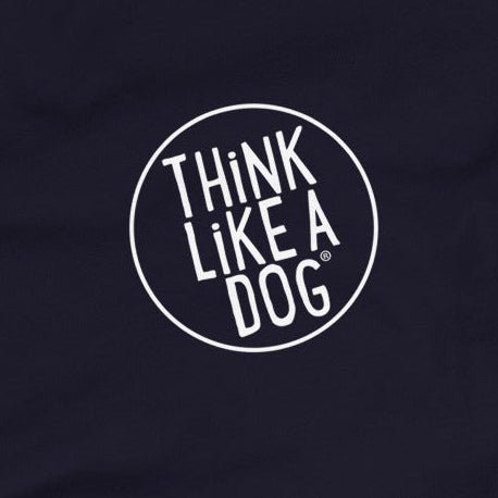 Black long sleeve unisex tee with "THiNK LiKE A DOG" in white text inside a circle, features a minimalist design. Perfect for dog lovers to capture their playful spirit. From the brand THiNK LiKE A DOG®.