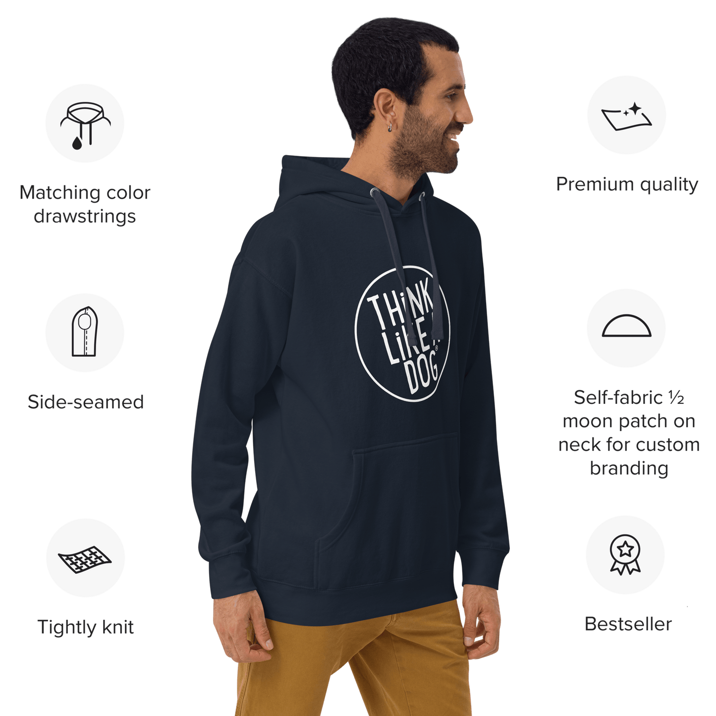 A man wearing a navy THiNK LiKE A DOG® Premium Hoodie, ideal for dog lovers. This bestseller features matching drawstrings, exceptional craftsmanship, side-seamed detailing, a self-fabric patch, and tightly knit fabric—making it the ultimate gift.