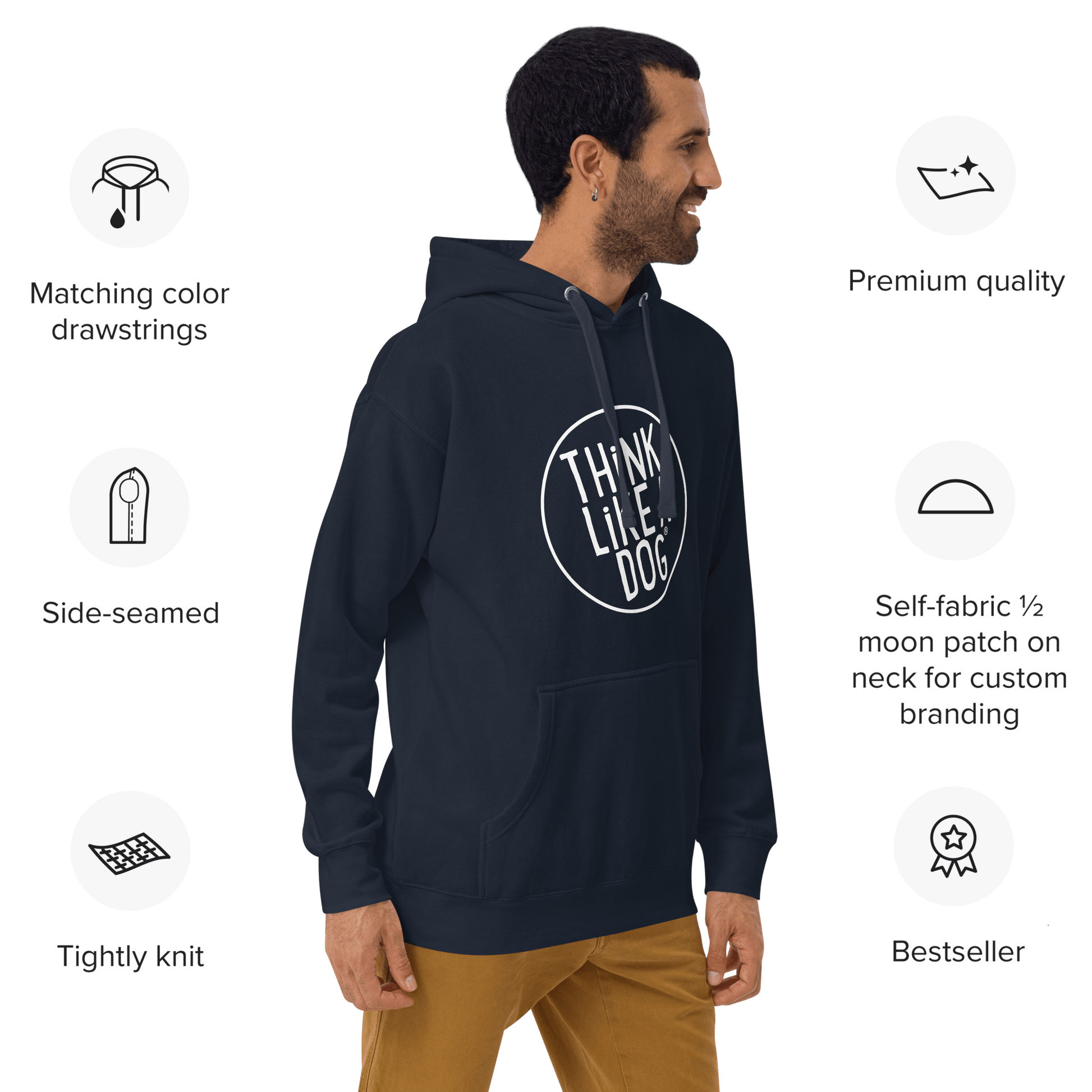 A man wearing a navy THiNK LiKE A DOG® Premium Hoodie, ideal for dog lovers. This bestseller features matching drawstrings, exceptional craftsmanship, side-seamed detailing, a self-fabric patch, and tightly knit fabric—making it the ultimate gift.