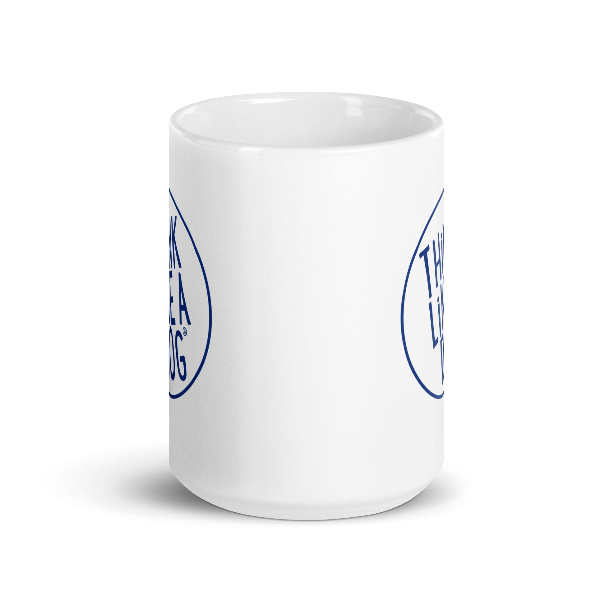 The Dog Lover Mug – Think Like a Dog Navy Logo by THiNK LiKE A DOG® is a white ceramic mug featuring a navy partial circular logo and "THINK LIKE A" text—an ideal gift for dog moms or any dog lover’s mug collection.