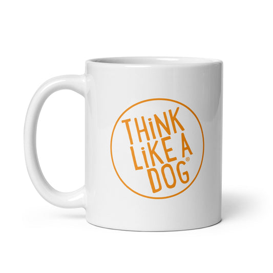 The THiNK LiKE A DOG® Think Like A Dog Mug – Vibrant Orange Logo is a white ceramic mug with a large handle, featuring "THINK LIKE A DOG" in bold orange inside a circle—ideal gift for dog lovers.