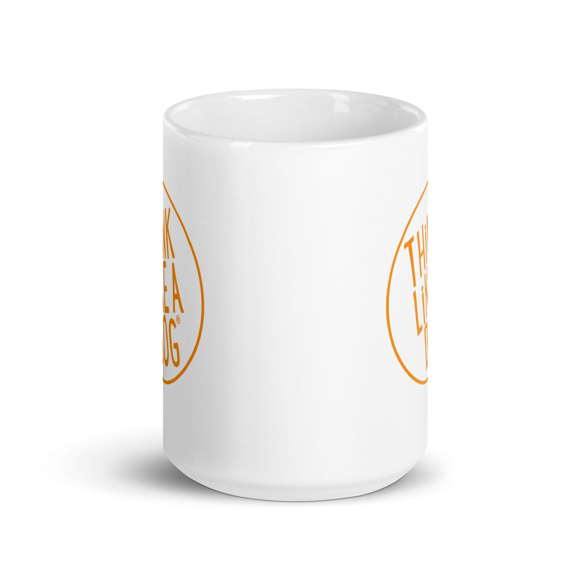 The THiNK LiKE A DOG® Think Like A Dog Mug features a white ceramic build with a vibrant orange logo, photographed on a white background.