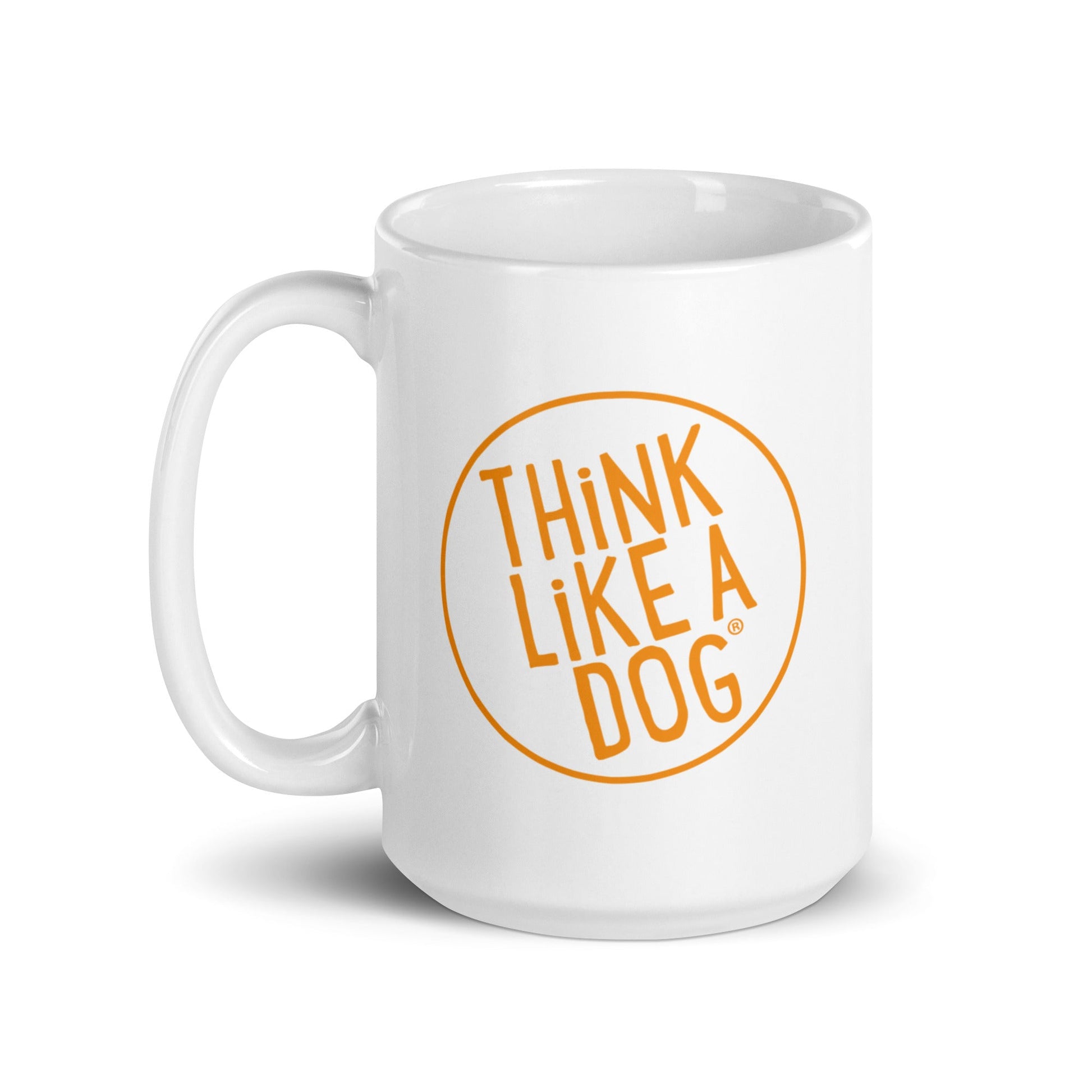 Enjoy your daily brew with the Think Like A Dog Mug – Vibrant Orange Logo by THiNK LiKE A DOG®—a white ceramic mug featuring “THINK LIKE A DOG” in orange, ideal for dog lovers and a perfect stylish gift.
