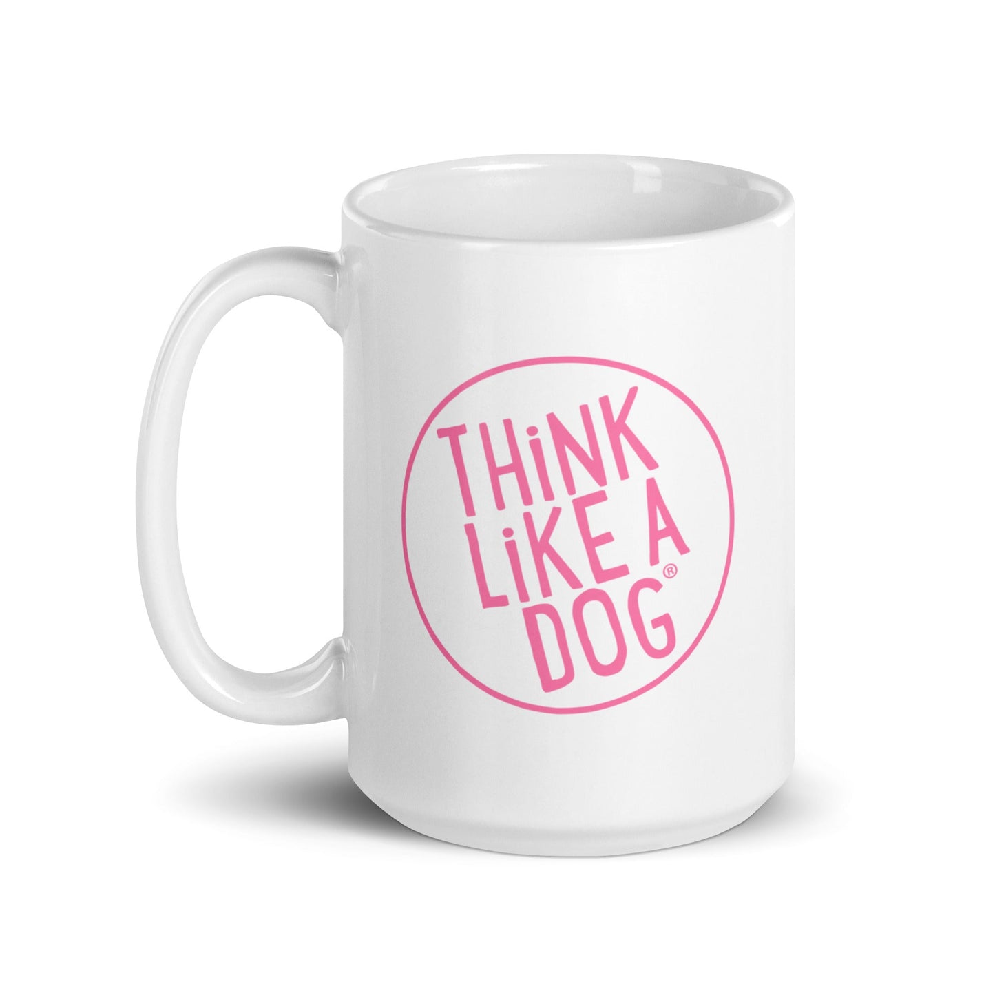The Dog Lover Mug – Think Like a Dog Pink Logo by THiNK LiKE A DOG® boasts a white ceramic build, large handle, and bold pink "THiNK LiKE A DOG" logo—ideal gift for dog moms.
