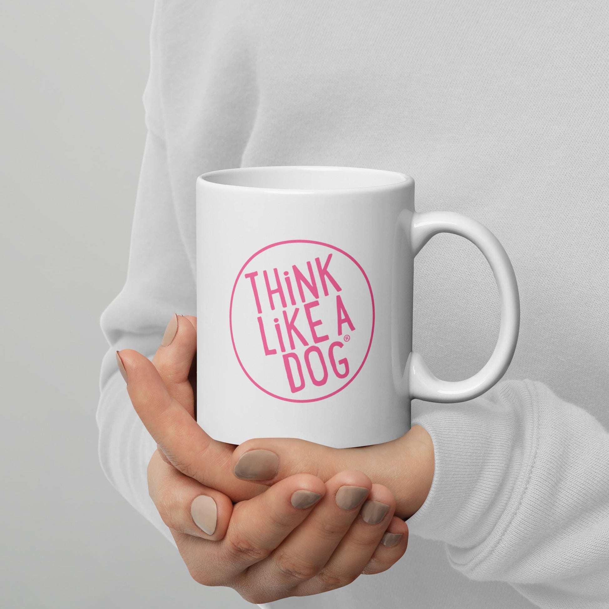 The Dog Lover Mug – Think Like a Dog Pink Logo by THiNK LiKE A DOG® features a pink "THiNK LiKE A DOG" circle design—an ideal gift for dog moms who adore their pups.