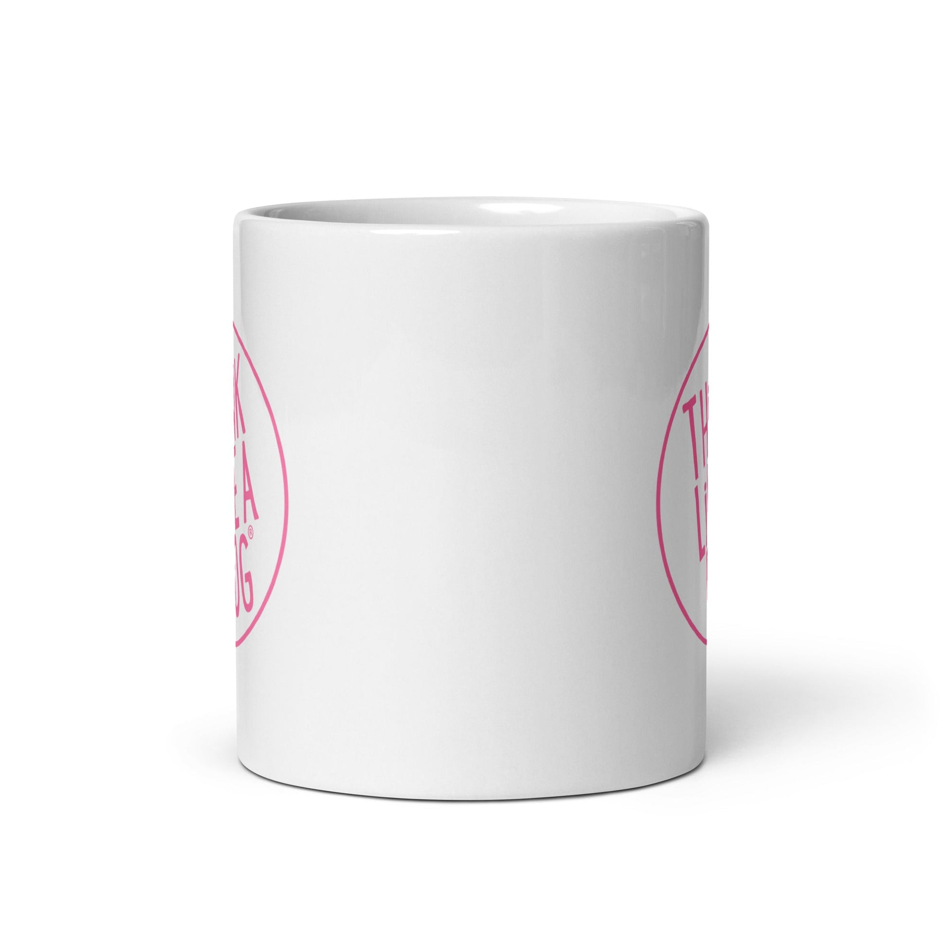 The Dog Lover Mug – Think Like a Dog Pink Logo by THiNK LiKE A DOG® features a white ceramic design with pink circular text on both sides. Ideal gift for dog moms or anyone seeking a unique mug for dog lovers. Displayed on a plain white background.