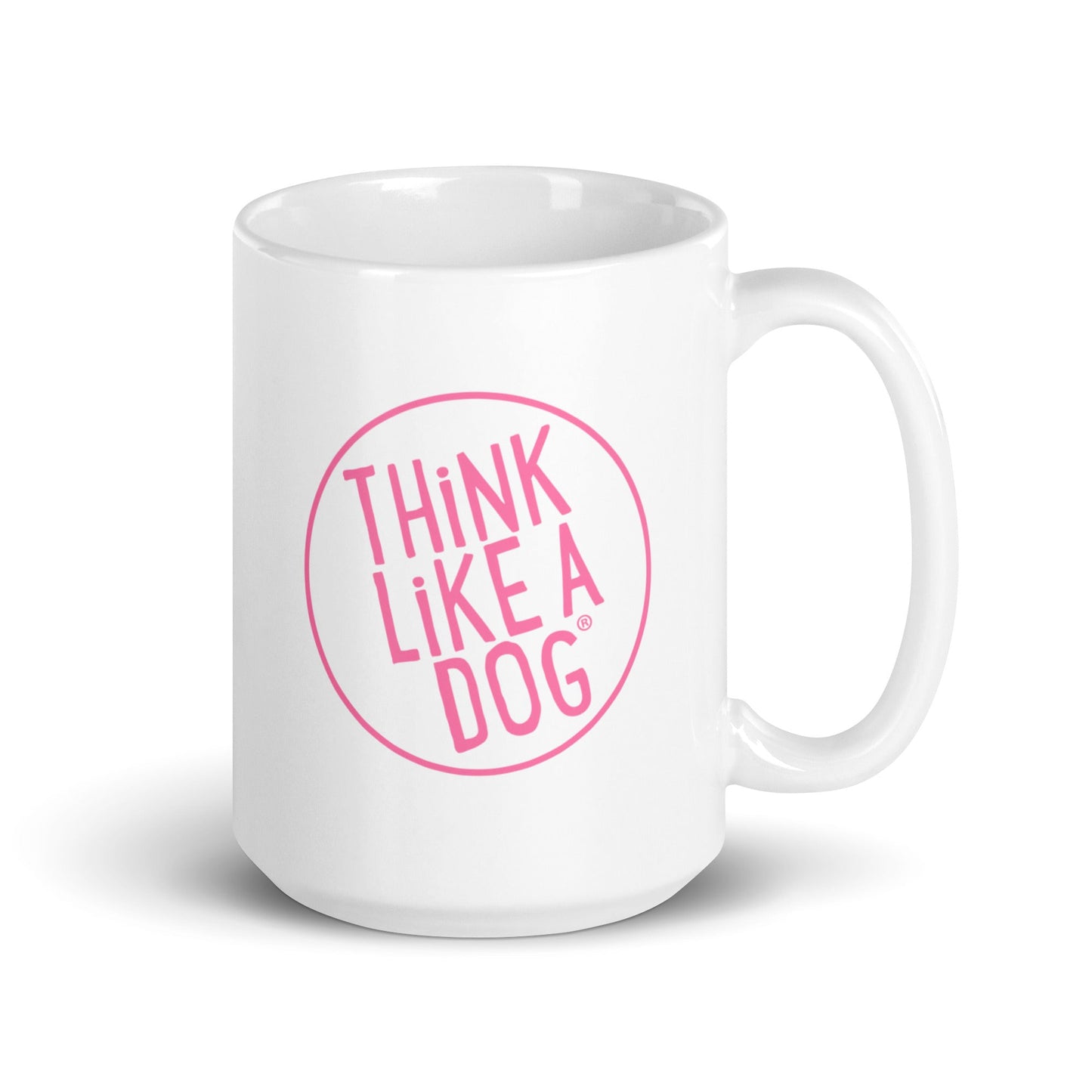 The Dog Lover Mug – Think Like a Dog Pink Logo by THiNK LiKE A DOG® is a white ceramic mug with "THiNK LiKE A DOG" in pink inside a circle—ideal as a fun gift for dog moms.