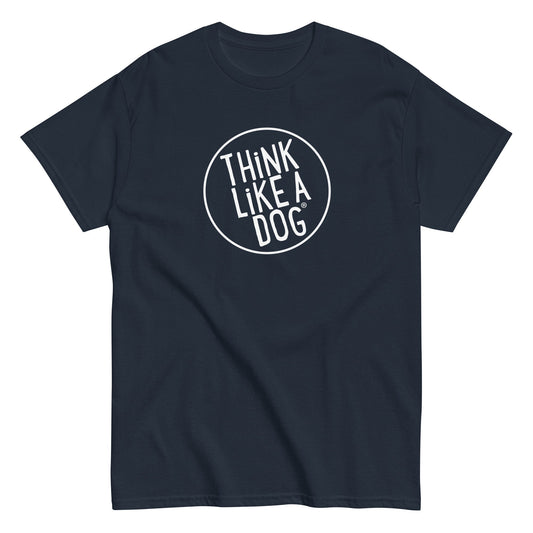 The Classic Men's Tee from THiNK LiKE A DOG® in navy blue is made from breathable cotton and features a white circular logo with the phrase "THiNK LiKE A DOG" on the front, making it perfect for dog lovers.