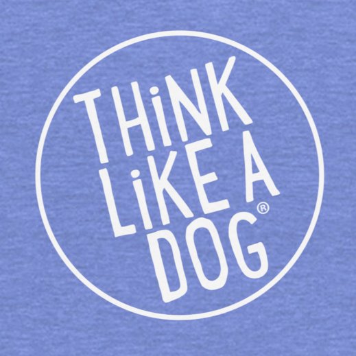 The THiNK LiKE A DOG® Toddler Short Sleeve Tee features "THiNK LiKE A DOG" printed in a white circle on a blue background, offering an ultra-soft and breathable design perfect for your little one.