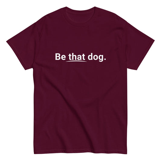 The "Be That Dog Simple Statement Tee" by THiNK LiKE A DOG® is a maroon, ultra-soft cotton shirt with a minimalist design and the phrase "Be that dog." printed in white on the front—ideal for any dog lover's collection.