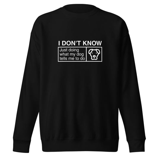 The THiNK LiKE A DOG® "I Don’t Know, Just Doing What My Dog Tells Me" sweatshirt is a cozy fleece in black featuring a simple dog face graphic, ideal humorous apparel for dog lovers who value their furry friends' advice.