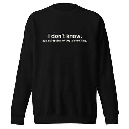 The THiNK LiKE A DOG® Funny Dog-Themed Sweatshirt – ‘I Don’t Know, Just Doing What My Dog Tells Me To Do’ is a cozy black sweatshirt perfect for dog lovers seeking a humorous, dog-themed attire.