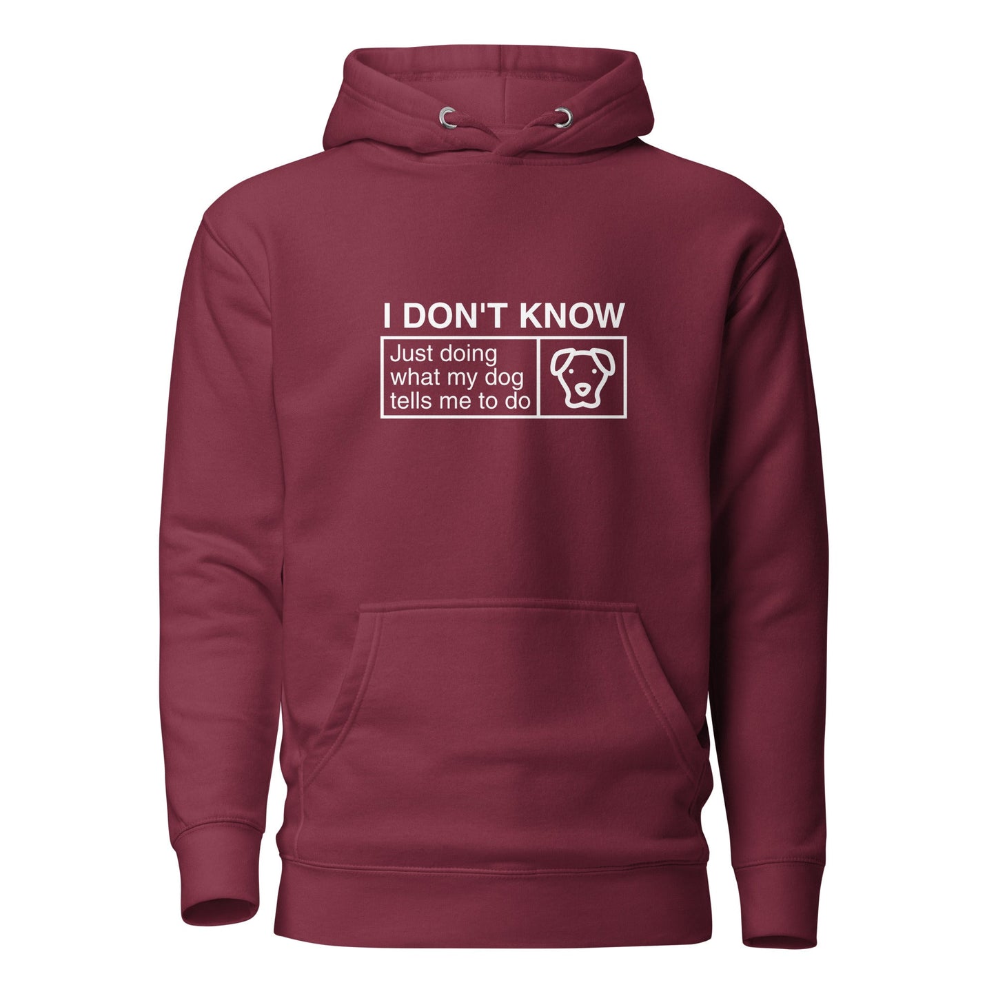 The Humorous Dog Hoodie by THiNK LiKE A DOG®, featuring the text "I Don’t Know, Just Doing What My Dog Tells Me To Do" alongside a cute and quirky dog icon in a square, makes for perfect humorous dog-themed apparel.