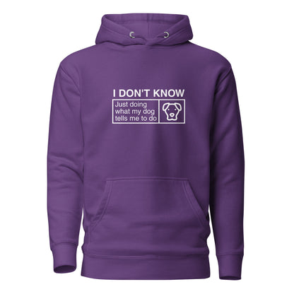 The THiNK LiKE A DOG® Humorous Dog Hoodie features the text "I DON'T KNOW, Just Doing What My Dog Tells Me To Do" alongside an icon of a dog's face. This cute and quirky hoodie is perfect for adding a touch of humor to your wardrobe.