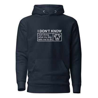 The THiNK LiKE A DOG® Humorous Dog Hoodie - "I Don’t Know, Just Doing What My Dog Tells Me To Do" with Dog Icon features a black hooded sweatshirt adorned with the witty text and an illustration of a dog's face. This playful hoodie is the perfect addition to any dog lover's collection of cute and quirky apparel.