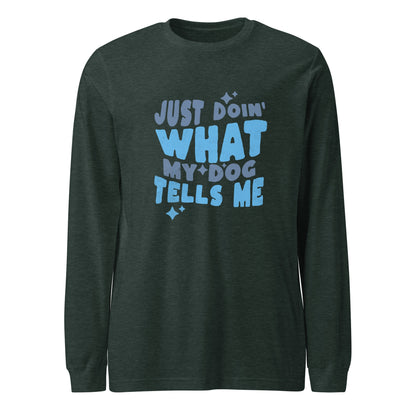 The THiNK LiKE A DOG® Quirky Dog-Themed Long Sleeve Shirt - 'Just Doin' What My Dog Tells Me' is a dark green shirt with a playful blue font, offering both style and comfort while giving off a fun vibe.