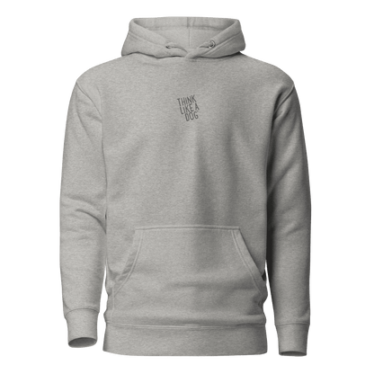 The THiNK LiKE A DOG® Think Like a Dog Hoodie — Everyday Comfort is a light gray unisex hoodie with a front pocket and "Think Like a Dog" in small uppercase letters on the chest—perfectly cozy for dog lovers.