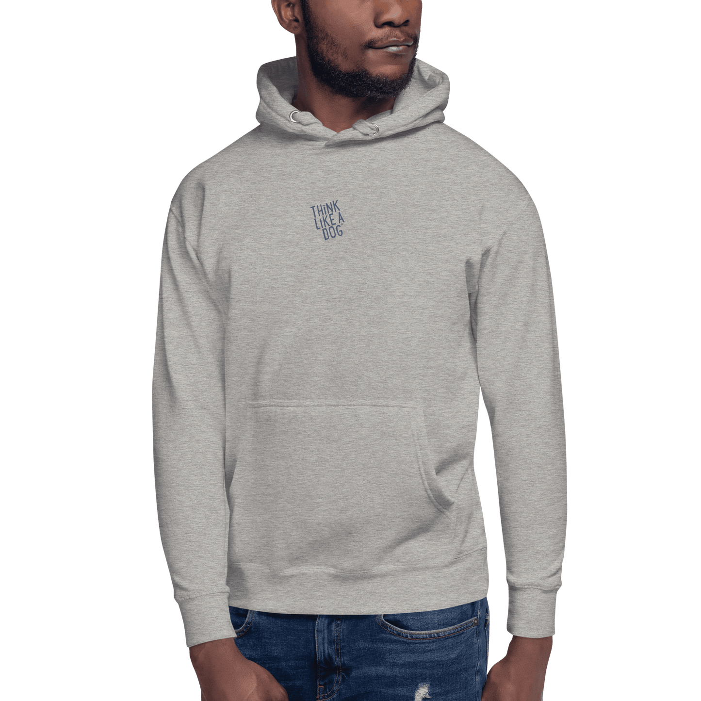 Man wearing the THiNK LiKE A DOG® Think Like a Dog Hoodie — Everyday Comfort in light gray, featuring "THINK LIKE A DOG" text on the upper chest, standing against a plain background.
