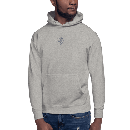 Man wearing the THiNK LiKE A DOG® Think Like a Dog Hoodie — Everyday Comfort in light gray, featuring "THINK LIKE A DOG" text on the upper chest, standing against a plain background.